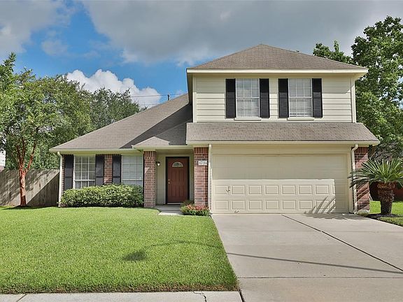 Double wide driveway provides plenty of space for guests to park when visiting.