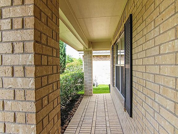 A covered porch is a fantastic place to relax and enjoy a visit with your new neighbors.