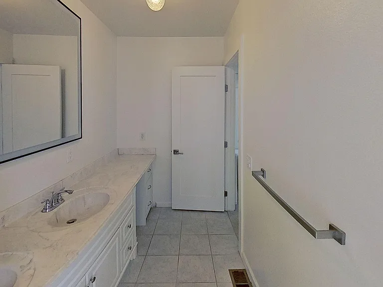 Upstairs bathroom, with shower and tub, and separate toilet room.