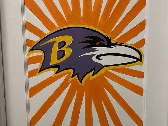 Mural on each door leading to a themed room. This is the Ravens Room