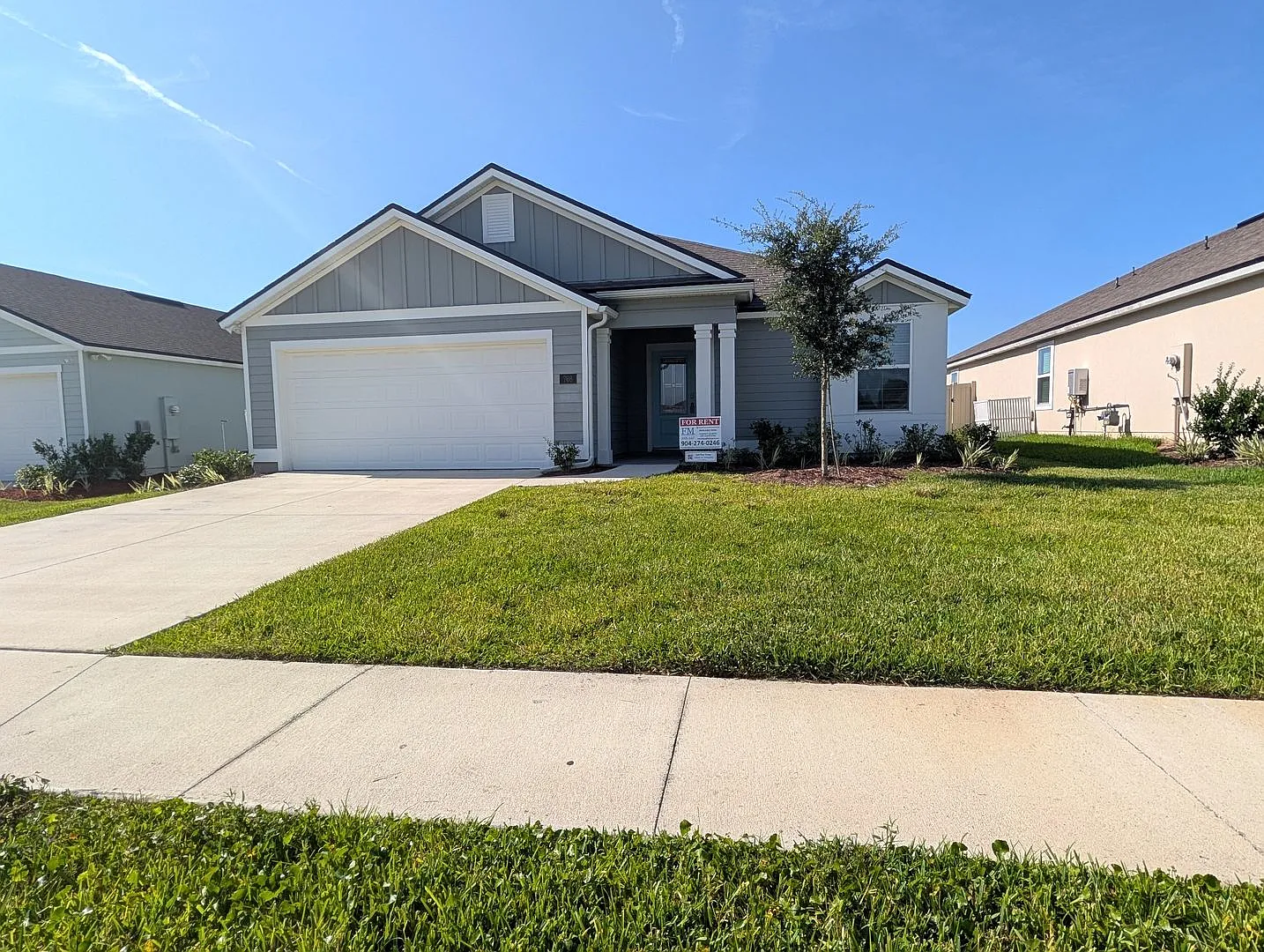Premium Price, Premium Finishes And Fully Fenced Rear Yard - This 3/2/2 In The Desirable Gated Do... — Photo 1