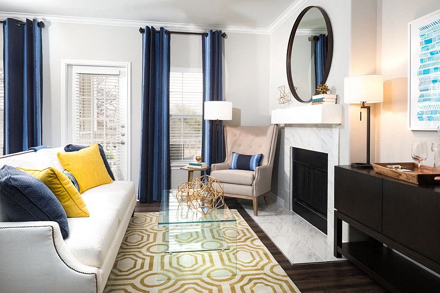 Fireplace with modern mantle and Carrara-style tile surround available