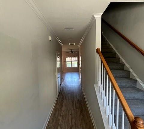 Front Door Hallway, Powder Room to right and garage to left