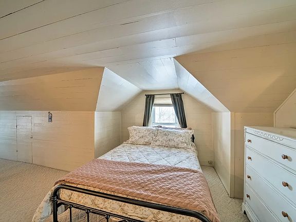 Upstairs bedroom, faces east and looks out to front yard.