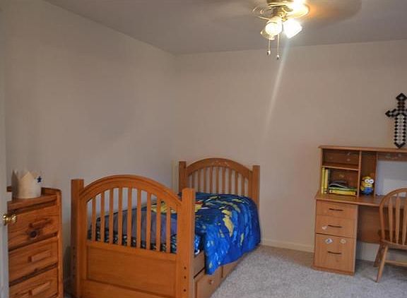 another view of the den/formal living room currently be used as a 7th bedroom