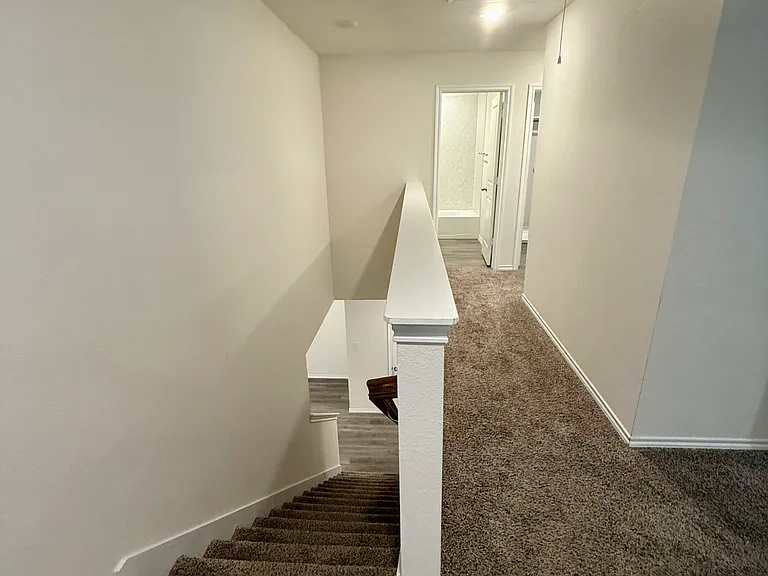 At top of stairs, looking towards guest bathroom