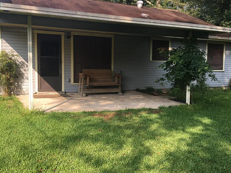 Covered patio, fenced backyard