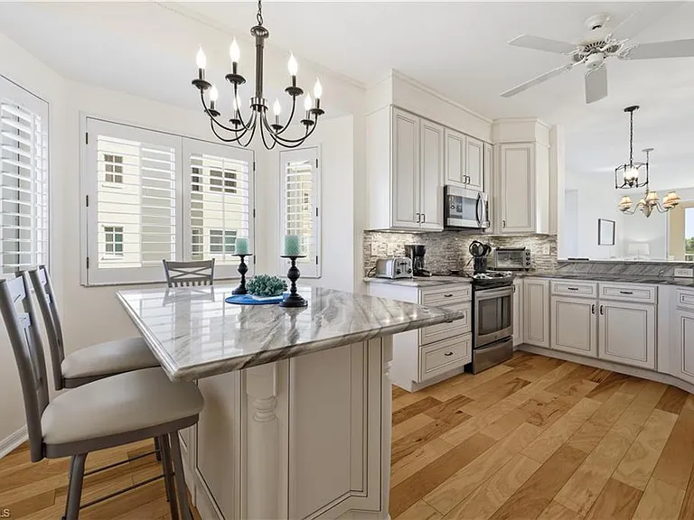 7687 Pebble Creek Cir #301 — Photo 11