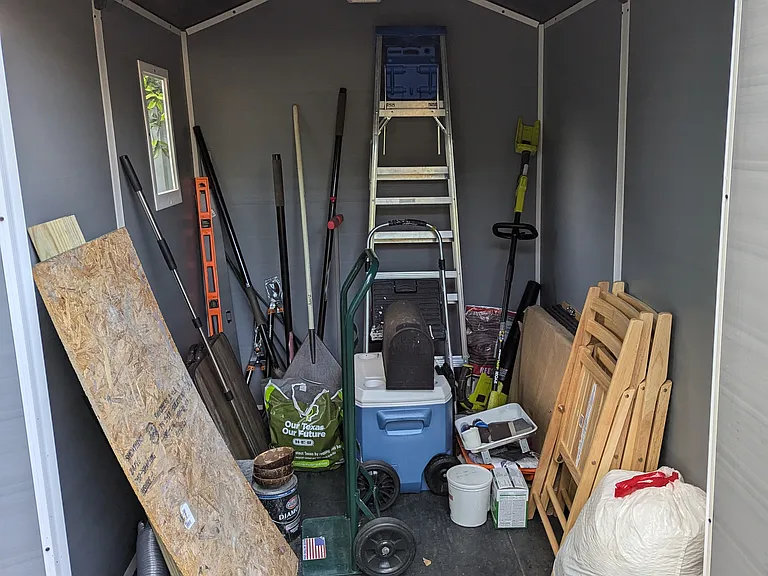 Inside the shed. It is quite big for you to store a lot of items.