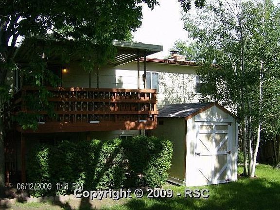Wonderful Covered Deck w/ Shades and Tuff Shed