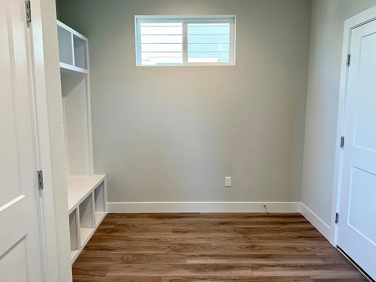 Large mud room off garage.