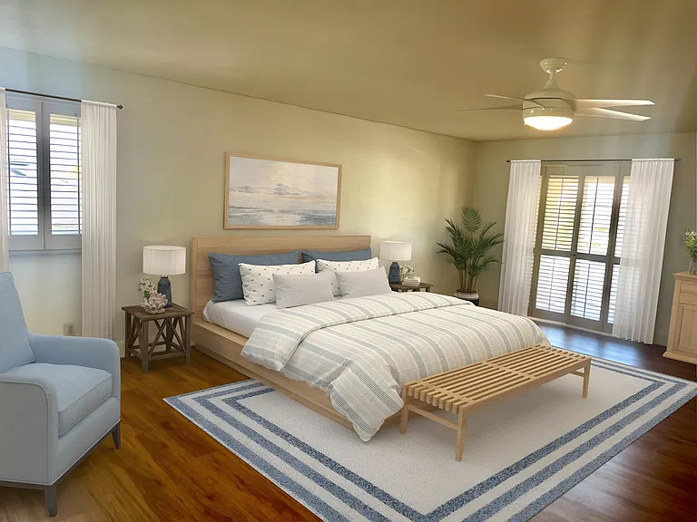 Huge primary bedroom with balcony.(virtually staged)