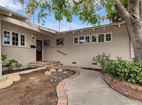 Courtyard entry with small porch.