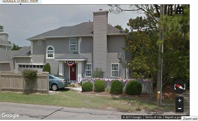 Two car garage with driveway.