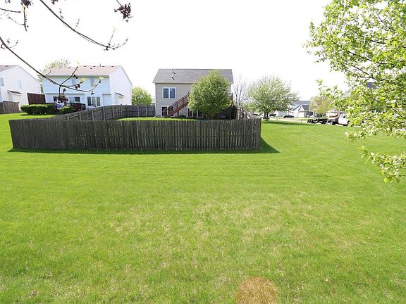 Backyard beyond fenced area