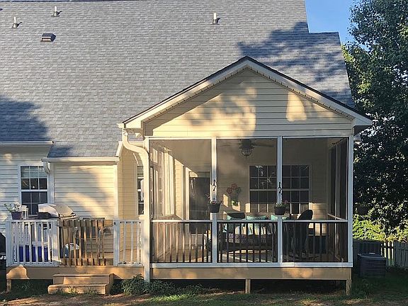Screened porch, sunset view.