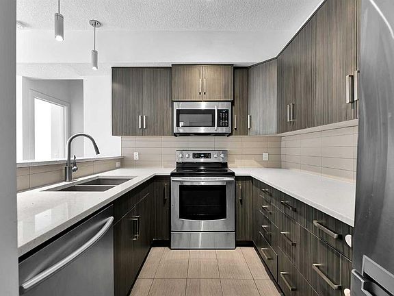5th image of 611 E Edmonton Trl NE #107