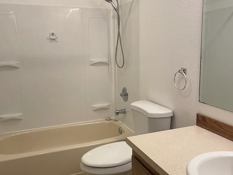 Full bath at top of stairs.