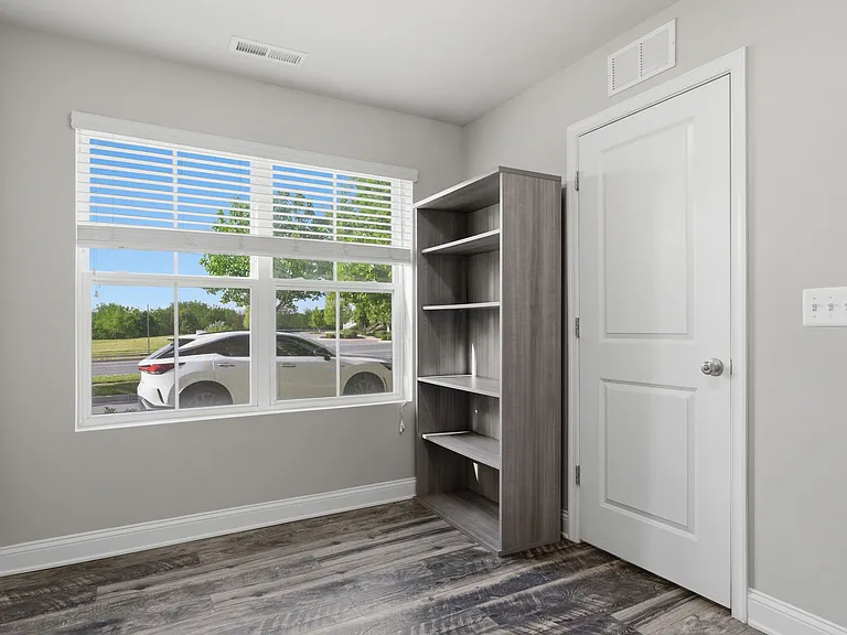 1st-floor bedroom with full bathroom