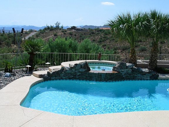Pool overlooks arroyo and mountains