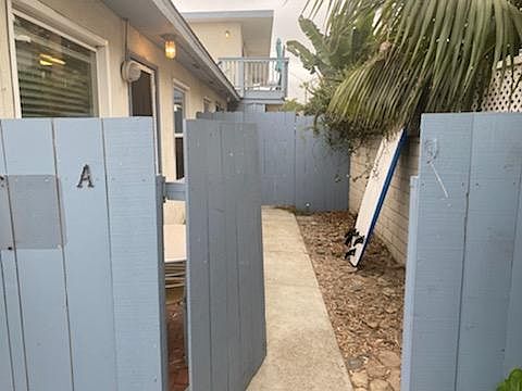 Entrance to fenced patio/yard