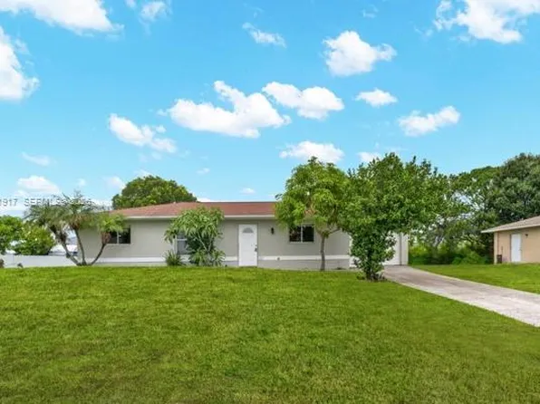 909 Sally Ave NE, Lehigh Acres, FL 33971