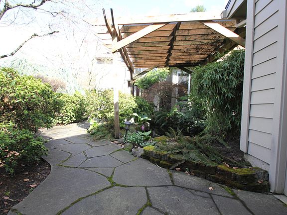 Entry with covered pond.