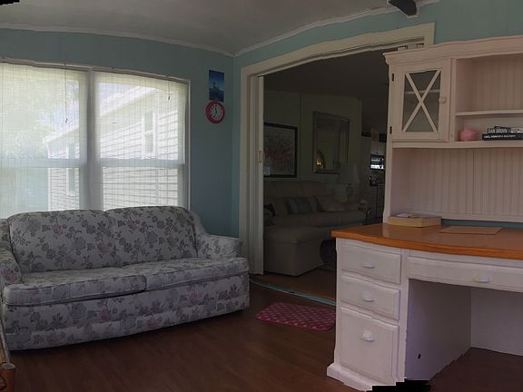 Lanai with sofa-bed and desk