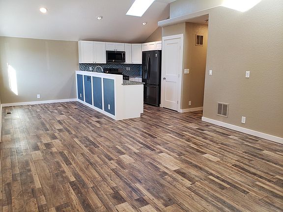 Dining area and kitchen from living area