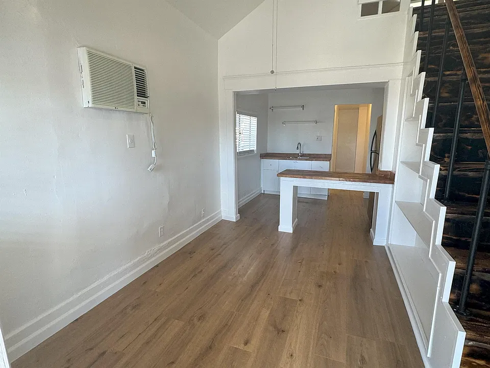 Newly Renovated! New Wood Flooring and New Paint!
