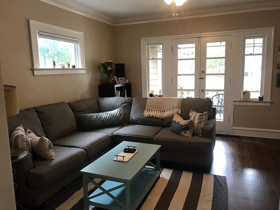 Living Room with Doors to bonus room in background