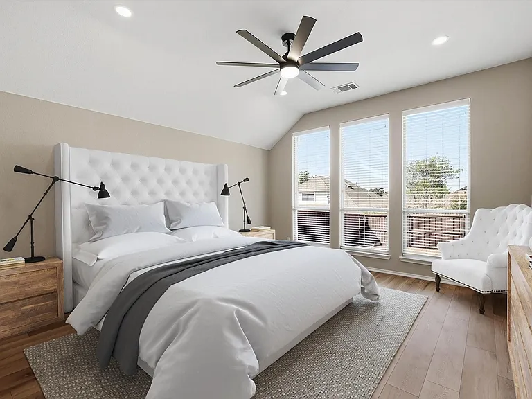 Vaulted ceiling room featuring wood-finish flooring, recessed lighting, and a contemporary ceiling fan