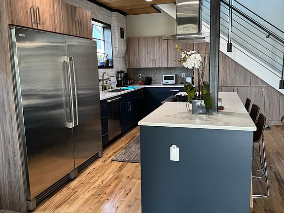 Kitchen with massive fridge/freezer
Custom cabinets