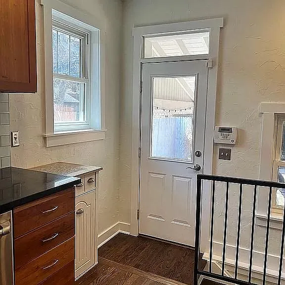 Back entry, stairs to basement