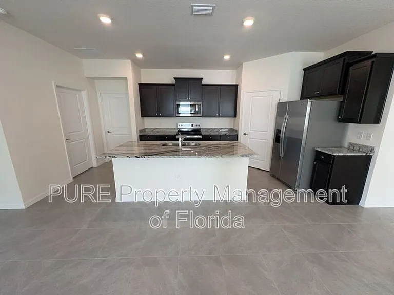 4122 NW 48th Terrace Rd — Photo 15