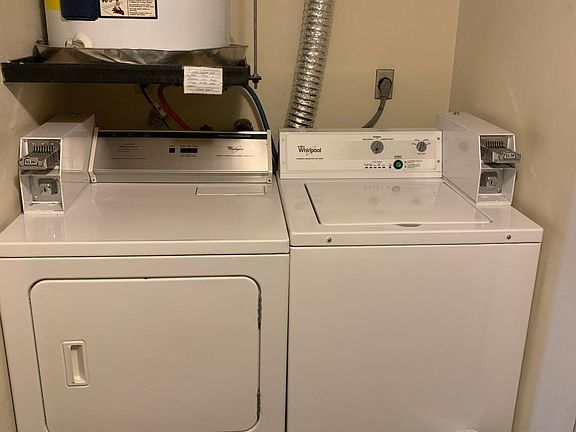 Coin operated laundry in building