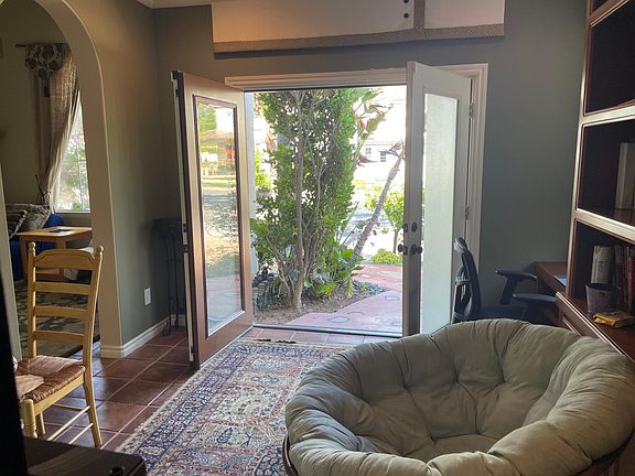 Kitchen to living room to outside