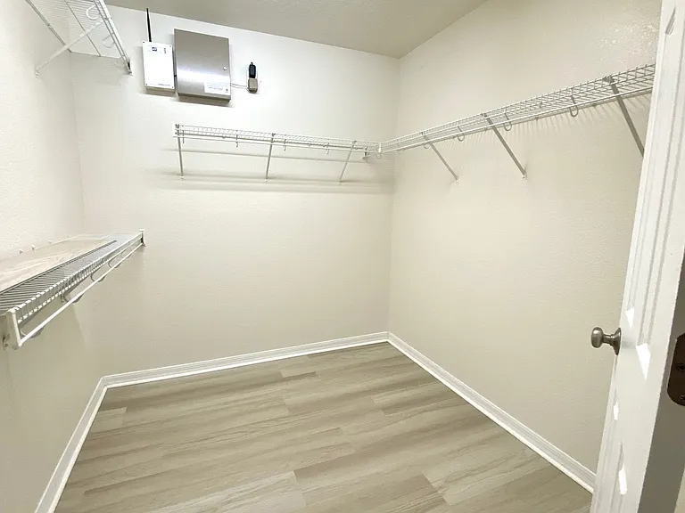 Very Large walk in closet in master bedroom