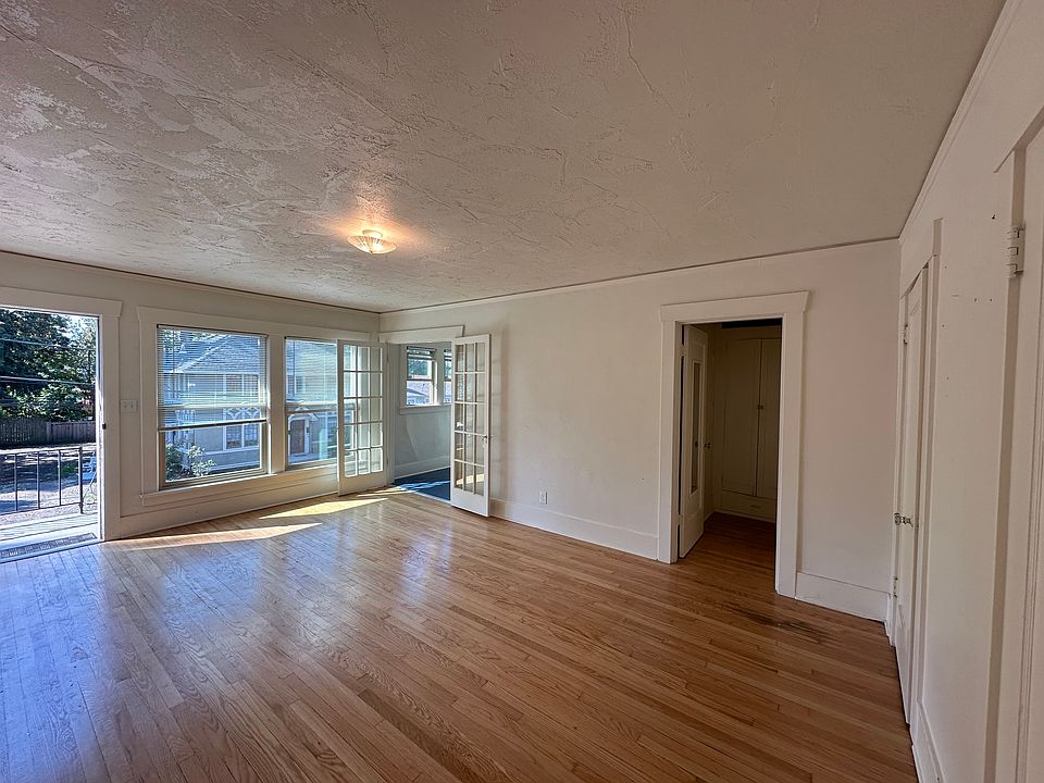 view of living space from back closet wall