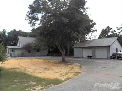 Front angle of the home with garage.