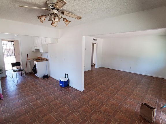 Kitchen/dining area and living room. Tile throughout