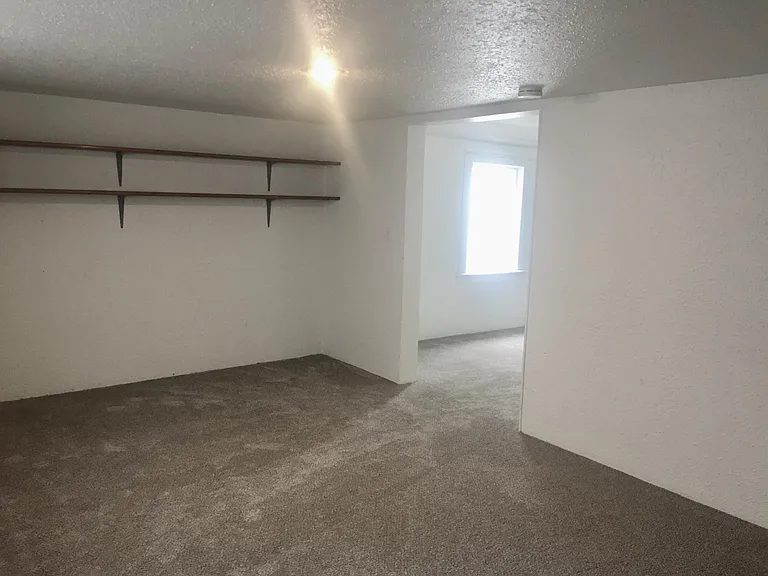 Looking from the second living space back into the main living room.