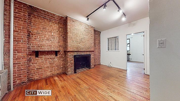 1st image of 309 E 9th St APT 3D