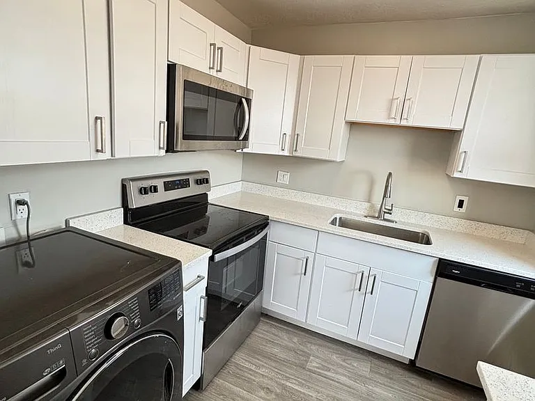 New Brigham Apartments — Photo 42