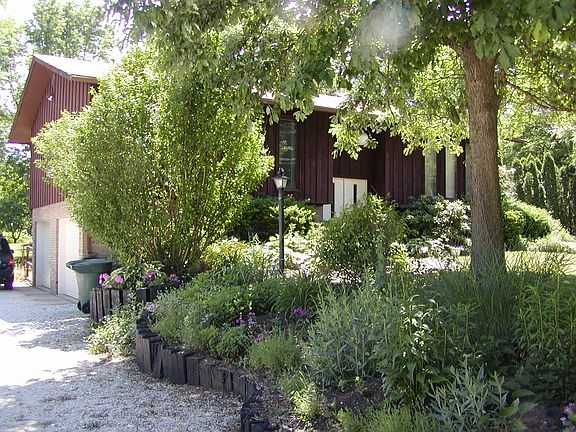 Driveway w/Gardens starting to bloom