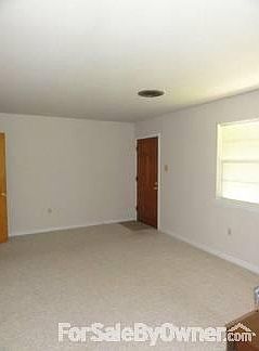 LARGE LIVING ROOM
						:
						Connects to Kitchen and Den