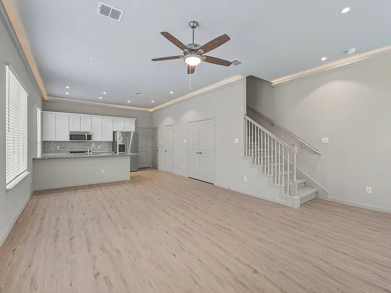 Open Concept Living/Dining Room with Crown Molding (Plan 3191)