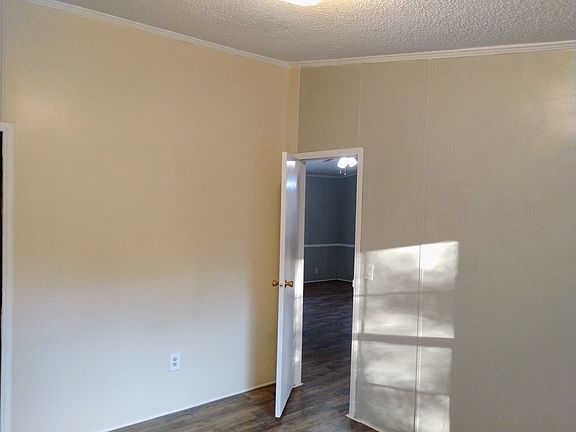 Side bedroom. Rear of house.