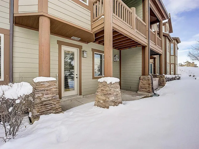 downstairs patio with main level deck above