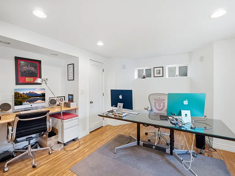 Bedroom 4 on lower level, set up here as an office.